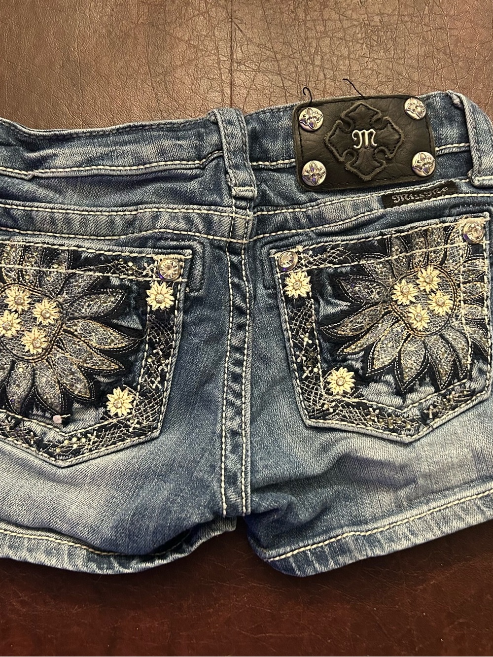 Miss Me Blue Denim Shorts with Silver Floral Embellishments